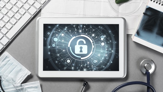 secure lock icon on tablet on doctor's table